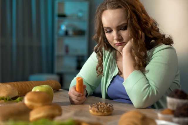 دراسة بريطانية: بلوغ الفتيات المبكر مرتبط باكتساب الوزن