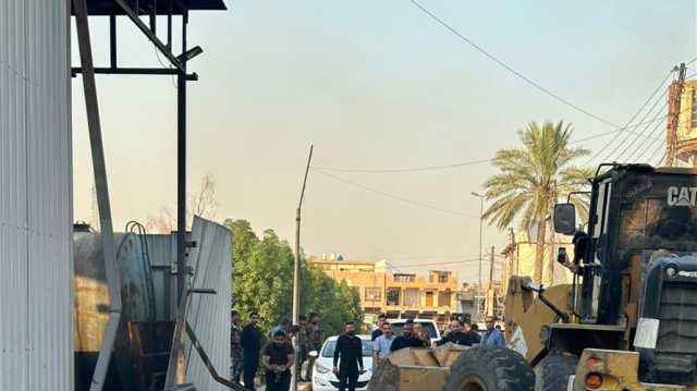 آليات عمليات بغداد تقتلع مولدات مخالفة للتسعيرة في حي الجهاد