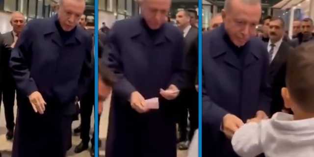 أردوغان يوزع 200 ليرة تركية في ألمانيا .. فيديو