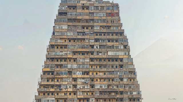 بناية سكنية على شكل حي شعبي.. حقيقة الصورة المتداولة في مصر