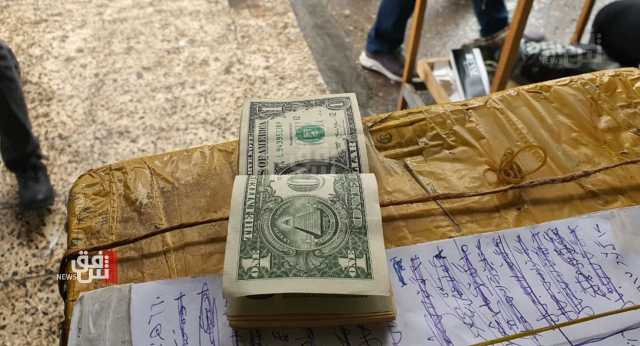 انخفاض أسعار الدولار مقابل الدينار العراقي في بغداد واربيل
