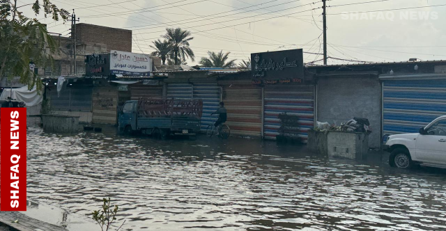 صيب السماء يعرقل الحياة في بغداد (صور)