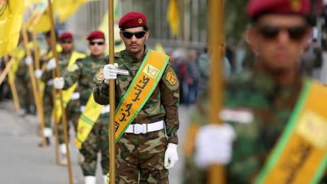 كتائب حزب الله تعلن تعليق عملياتها ضد القوات الامريكية وتوصي مقاتليها بـالدفاع السلبي مؤقتاً